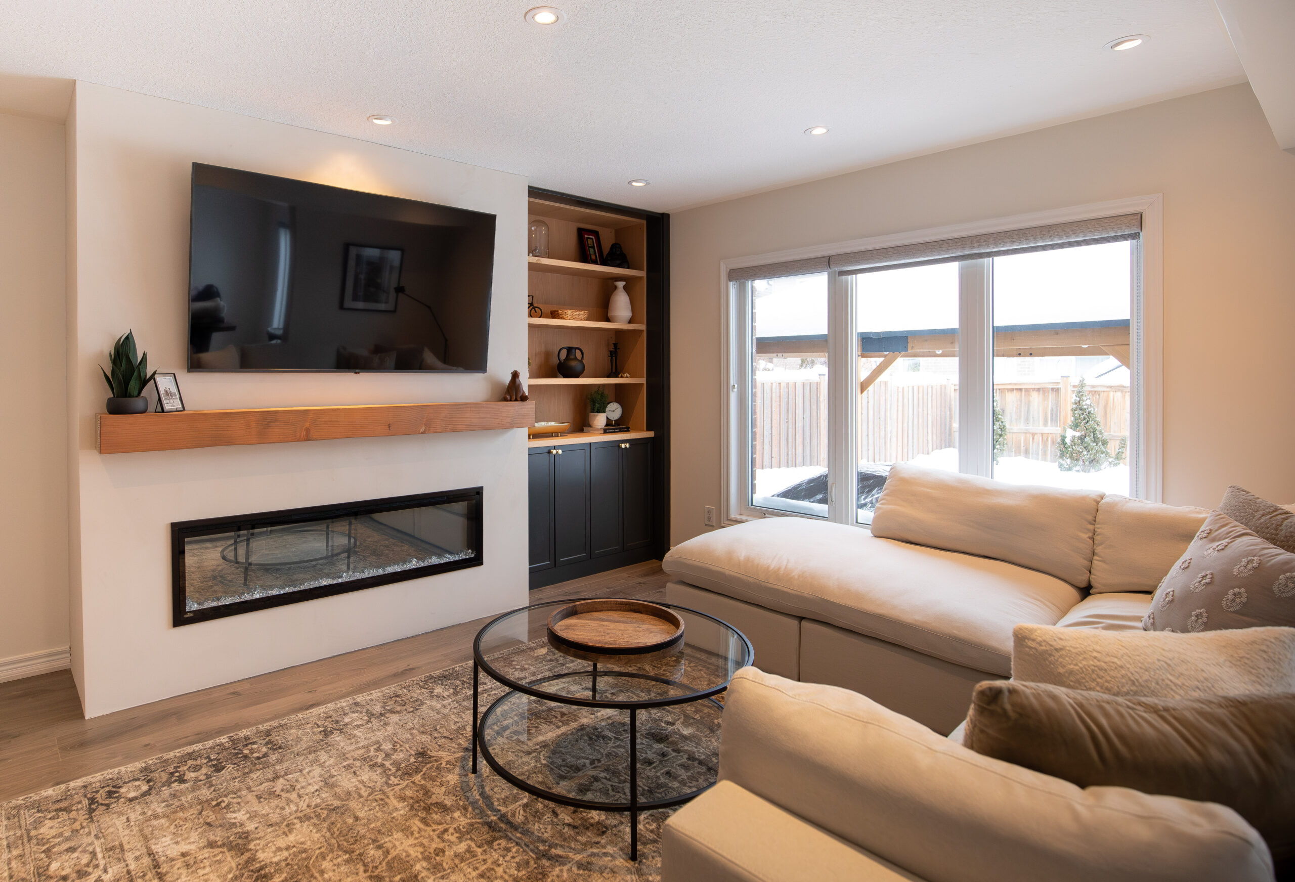 living room makeover with custom fireplace and shelving